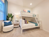 Twin over full bunkbed kid children's family luxurious modern 4 bedroom vacation home rental in Orlando near Disney World Universal SeaWorld with private pool and game room.