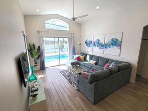 Designer boutique unique interior decorated modern living room of Orlando vacation rental home near Disney World.