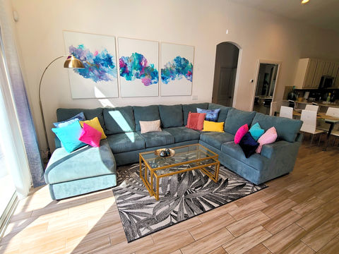 Designer boutique unique interior decorated modern living room of Orlando vacation rental home near Disney World.