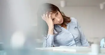 woman stressed at work
