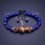 Thumbnail: tigers eye and lapis lazuli beaded bracelet for men / women. adjustable size with 8mm beads and rose gold crown charms