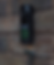 Black video doorbell with green-lit button on brick wall. "SPRO" text visible above button. Metal number "7" beneath.