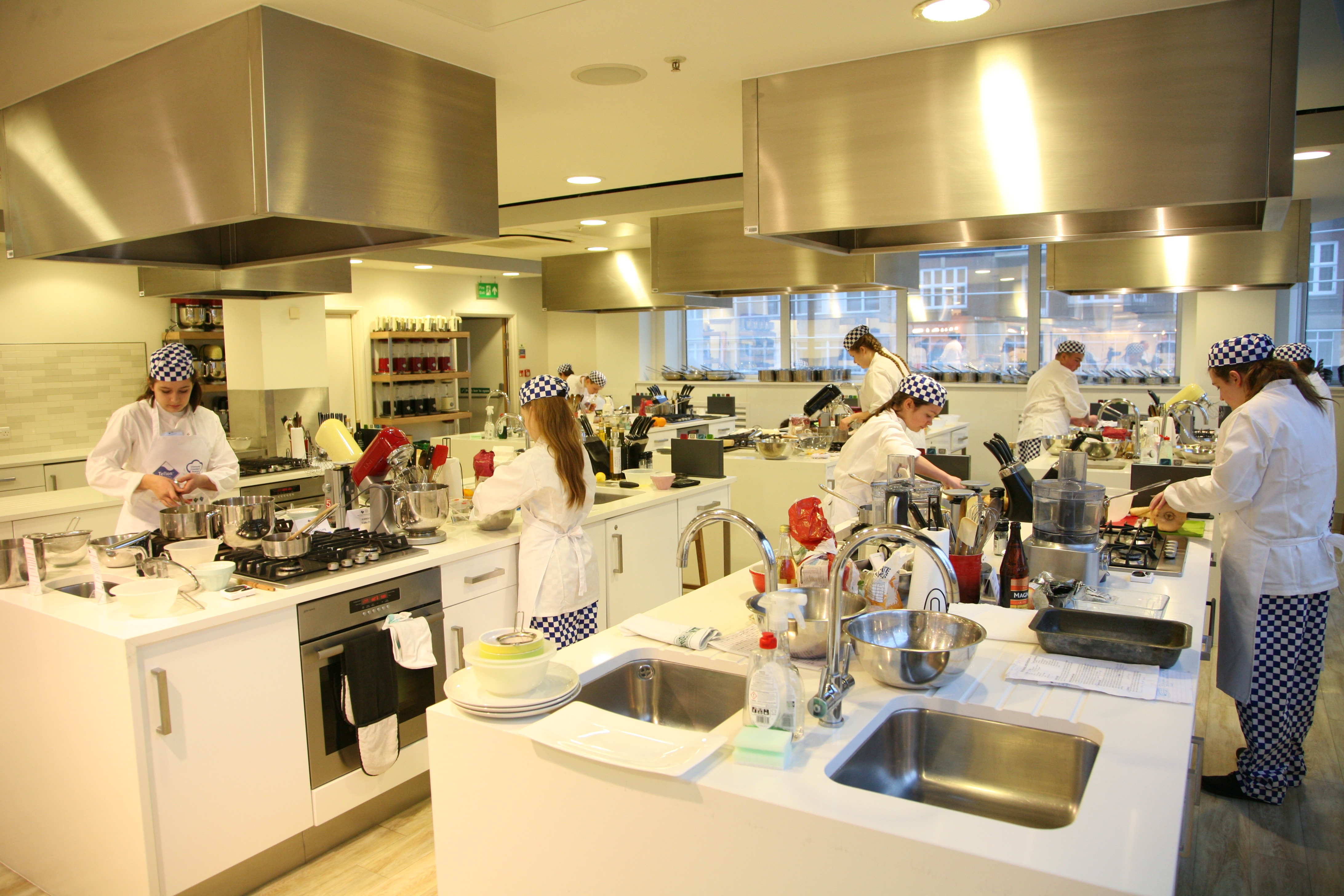 Keen Young Cooks Prepare Their Dish