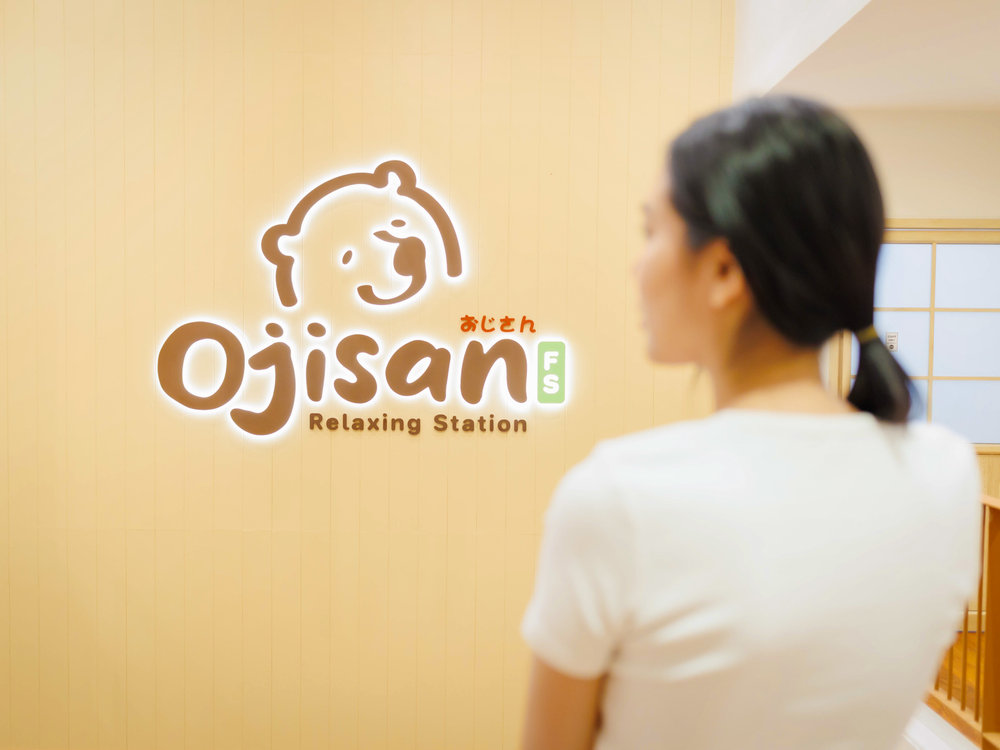 Ojisan Relaxing Station branded wall