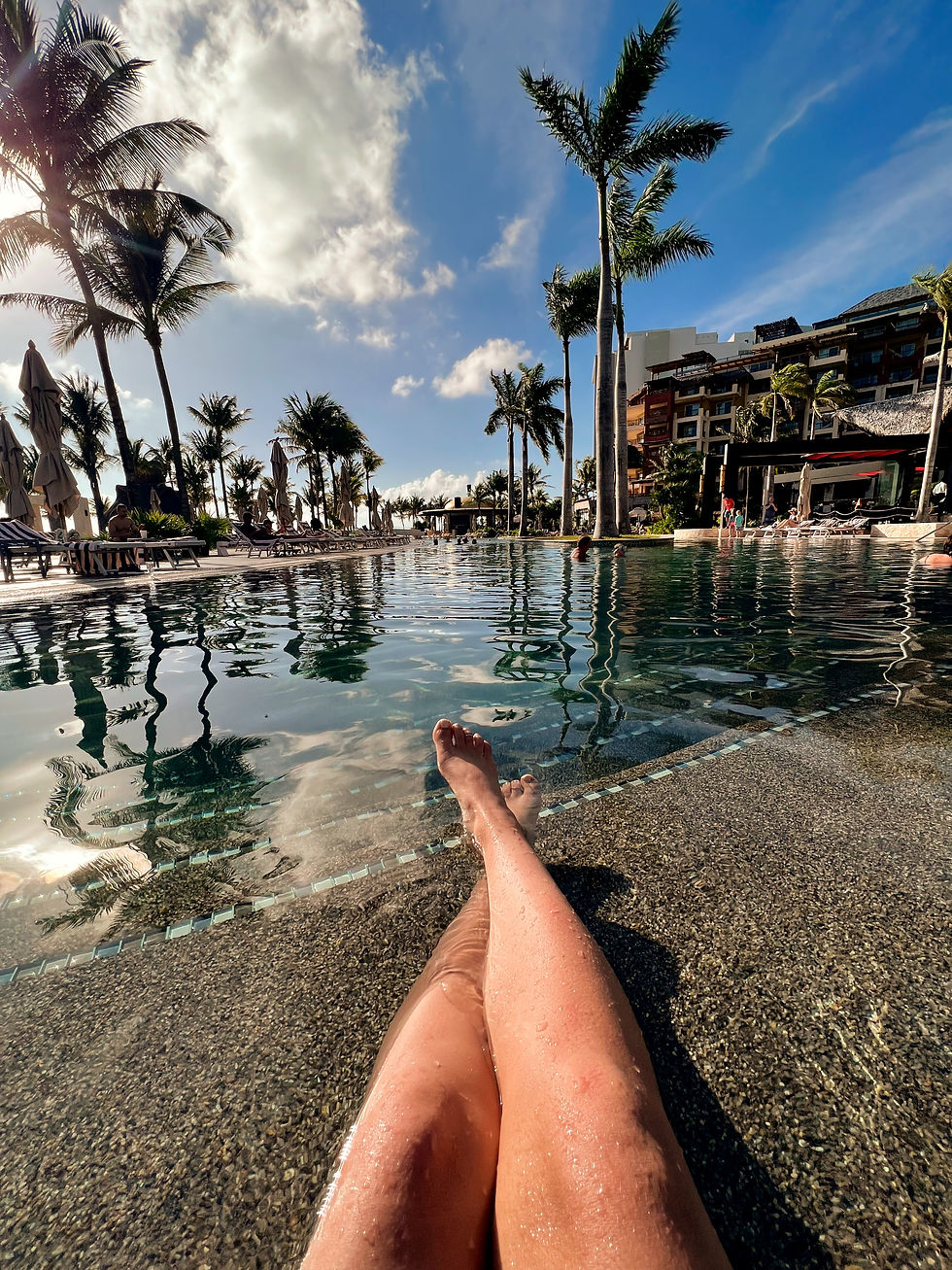 Lounging poolside at Villa del Palmar in Cancun Mexico.