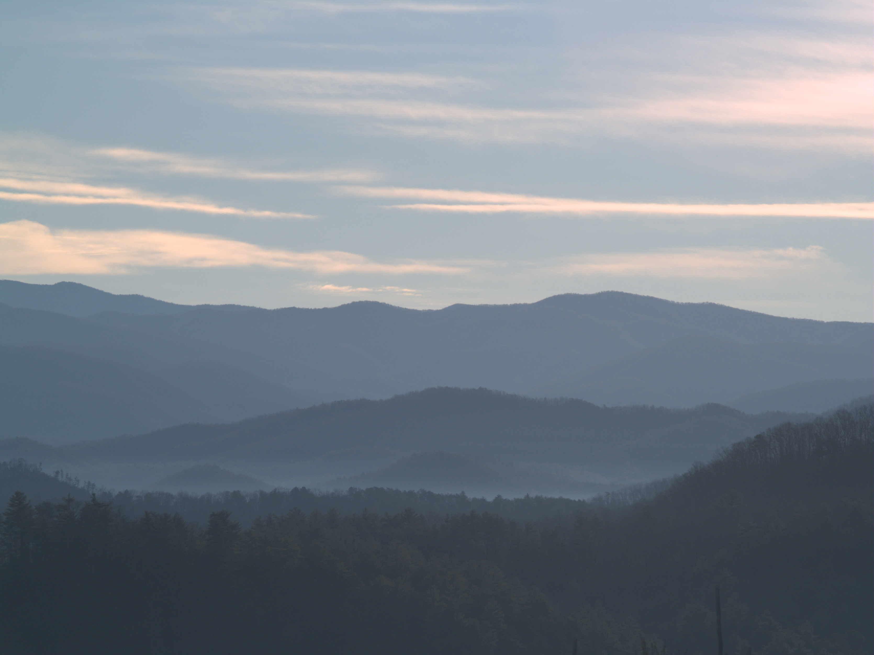 Layered blue ridges at dusk on Foothills Parkway near Walland, Tennessee