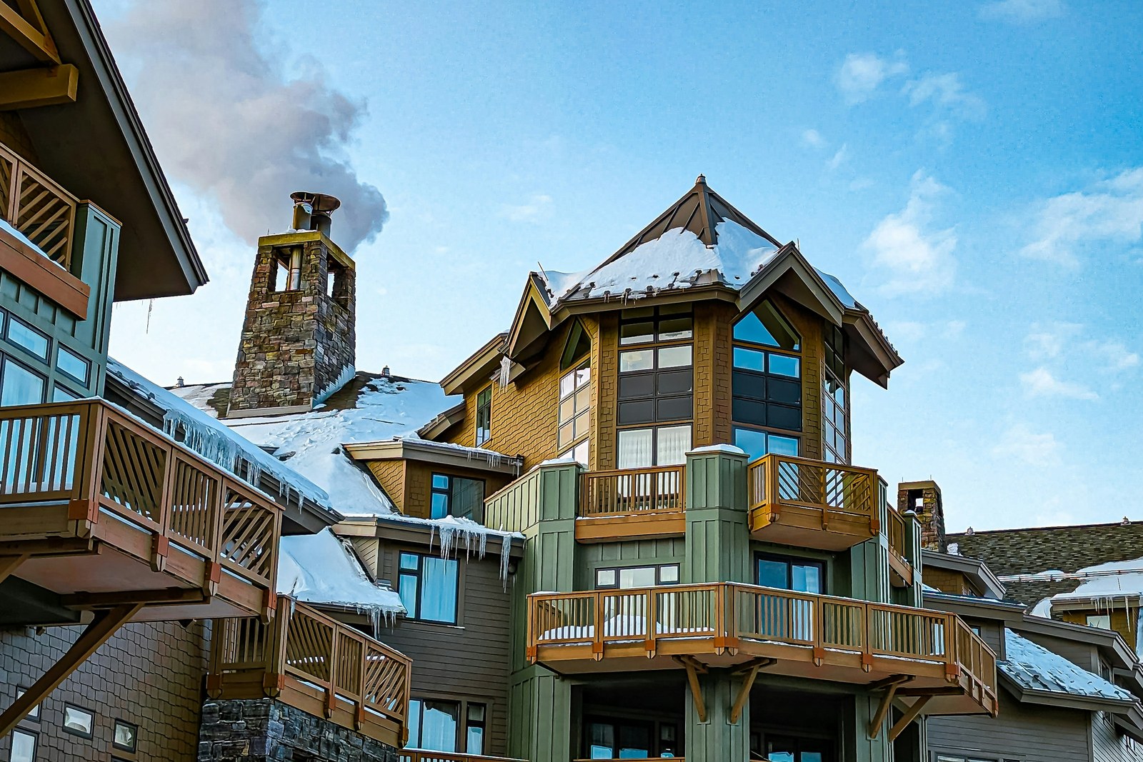 Spruce Peak village lodges and balconies in winter at Stowe