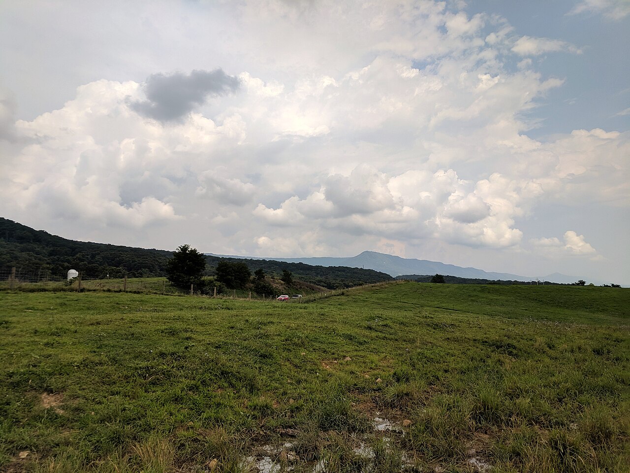 Pasture in the foreground and Massanutten Mountain on the horizon, Virginia.