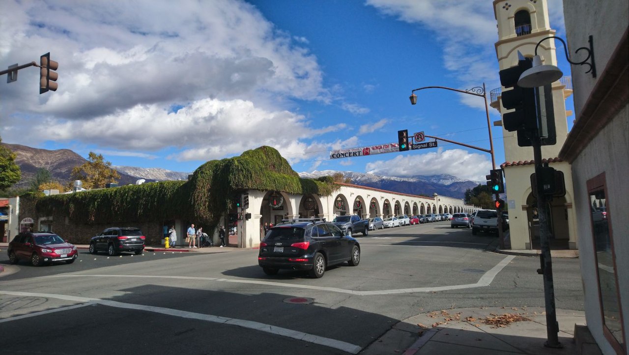 Downtown Ojai arcade and post-office tower with the Topa Topa range behind.