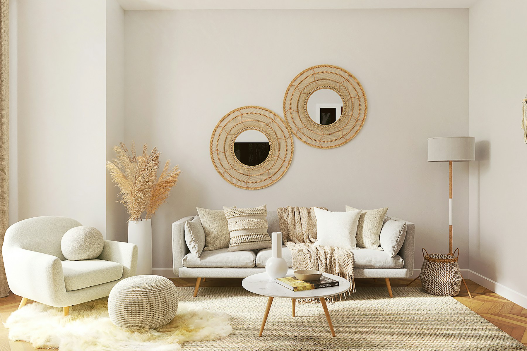 Beige sofa with two rattan mirrors and pampas grass