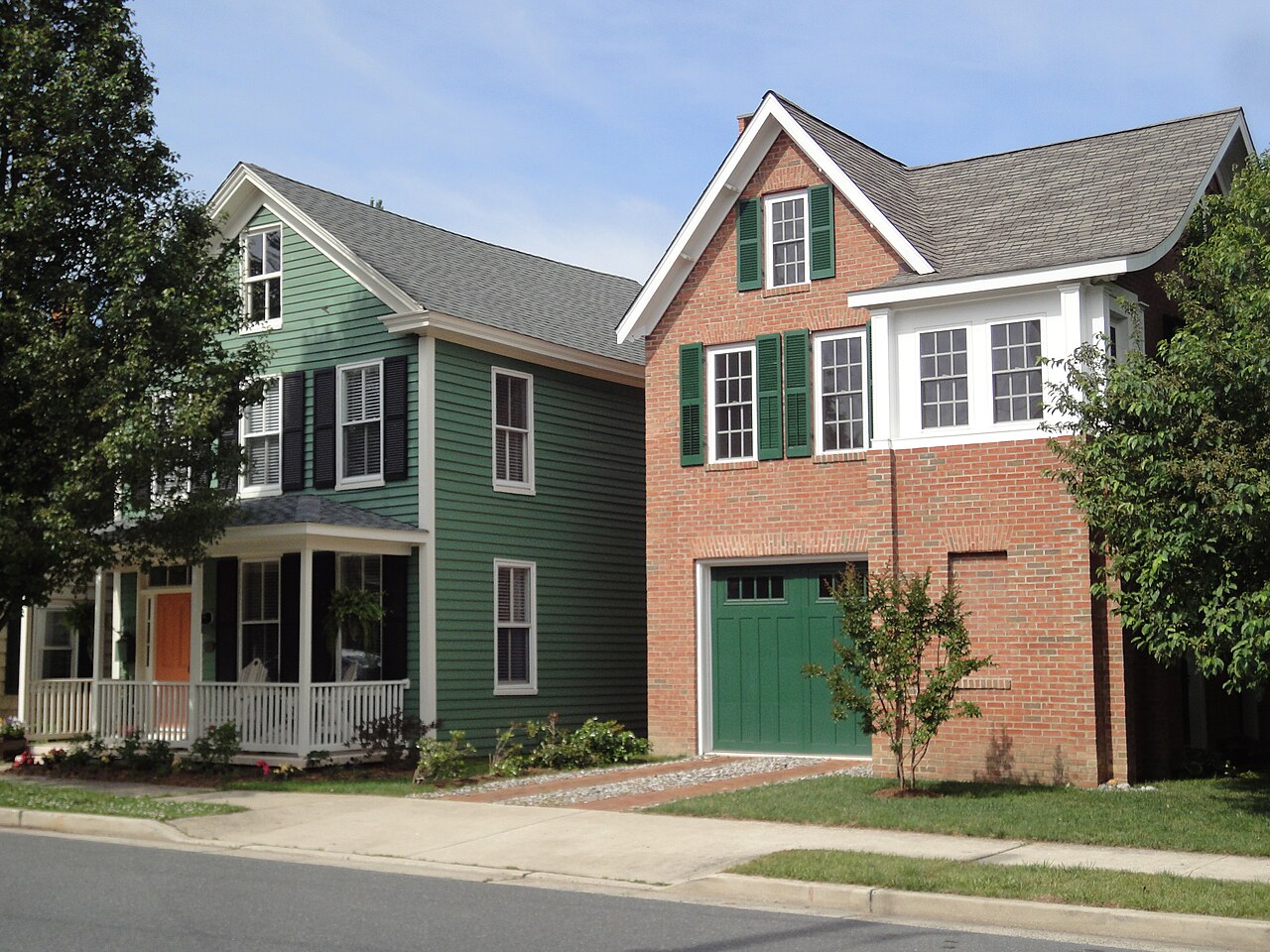 Newer clapboard and brick houses on a quiet Easton street.