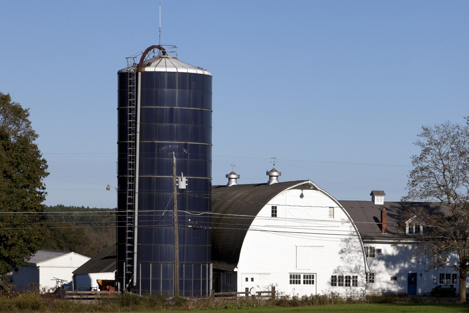 White barn and silo on a working Woodstock, Connecticut farm