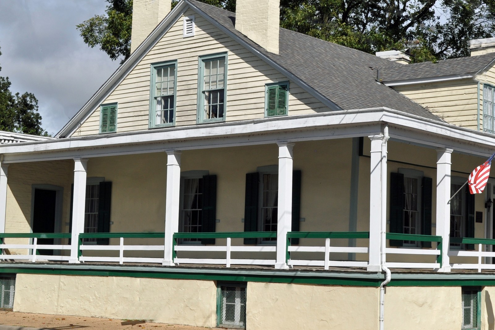 Colonial wrap-porch stay exterior, no faces