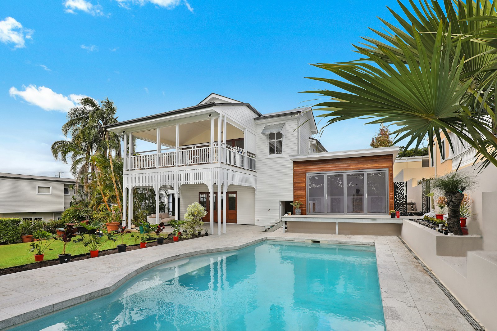 White vacation house and pool, no faces