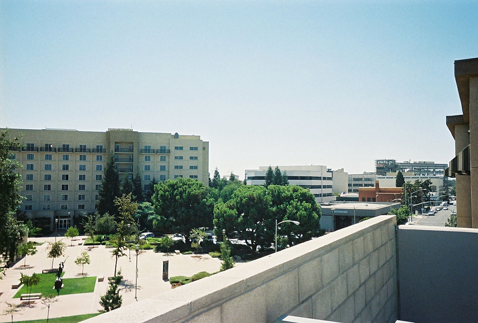 Downtown Visalia California valley city compared with Three Rivers foothill stays, neighbor only, no people
