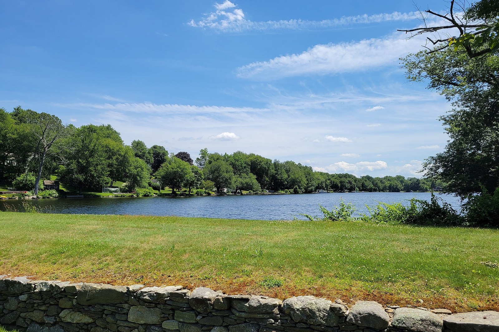 Quasset Lake and stone wall in Woodstock, Connecticut