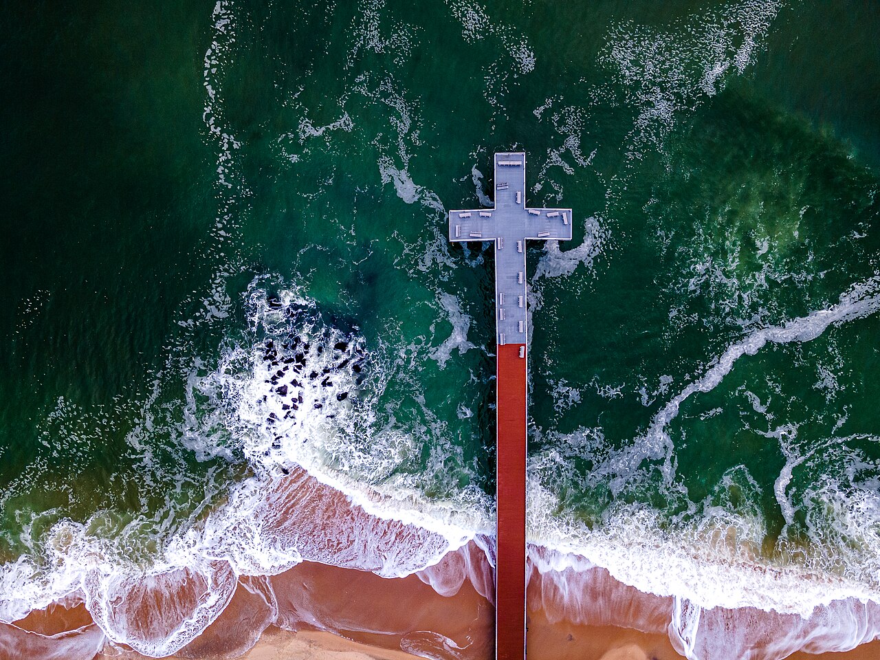 Cross-shaped fishing pier at Ocean Grove beach