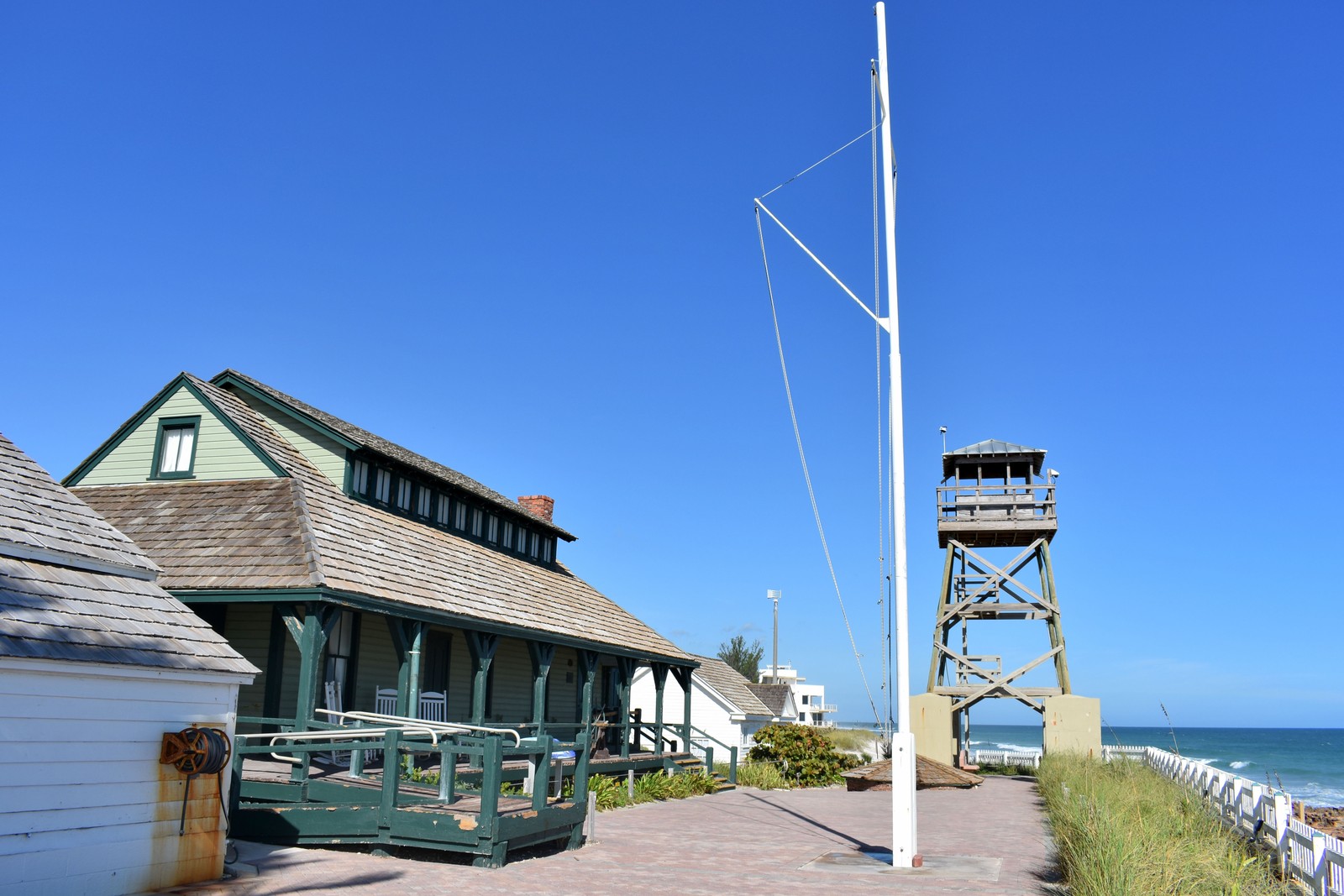 Coastal house exterior, Gulf stay, no faces