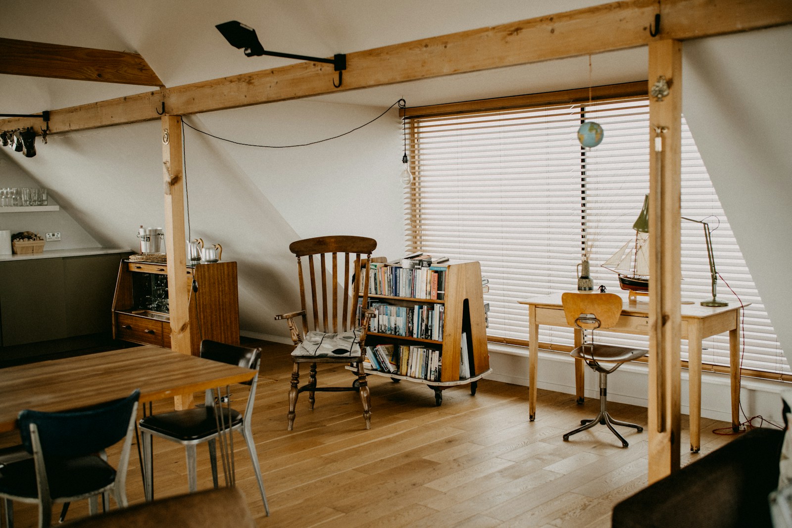 Cabin loft with wood beams, no faces