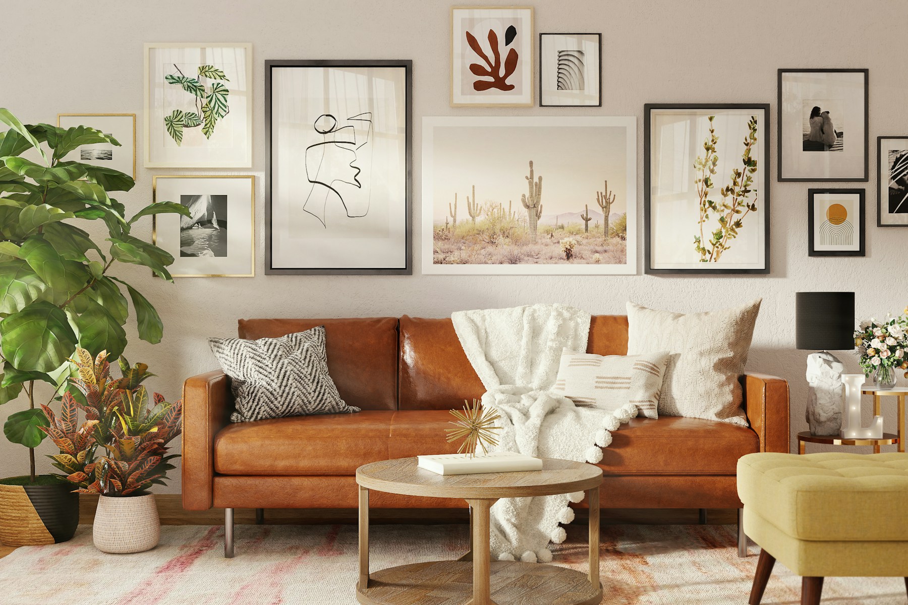 Brown leather sofa under a gallery wall in a rental living room