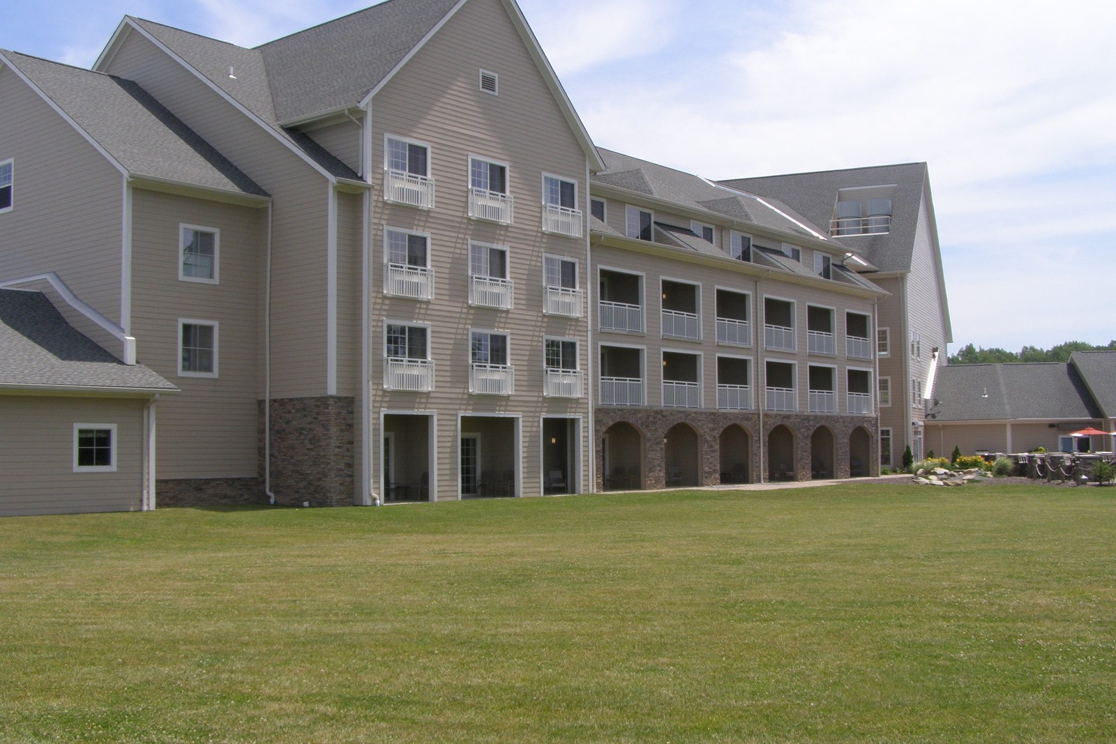 Lodge building facing a lawn, no faces
