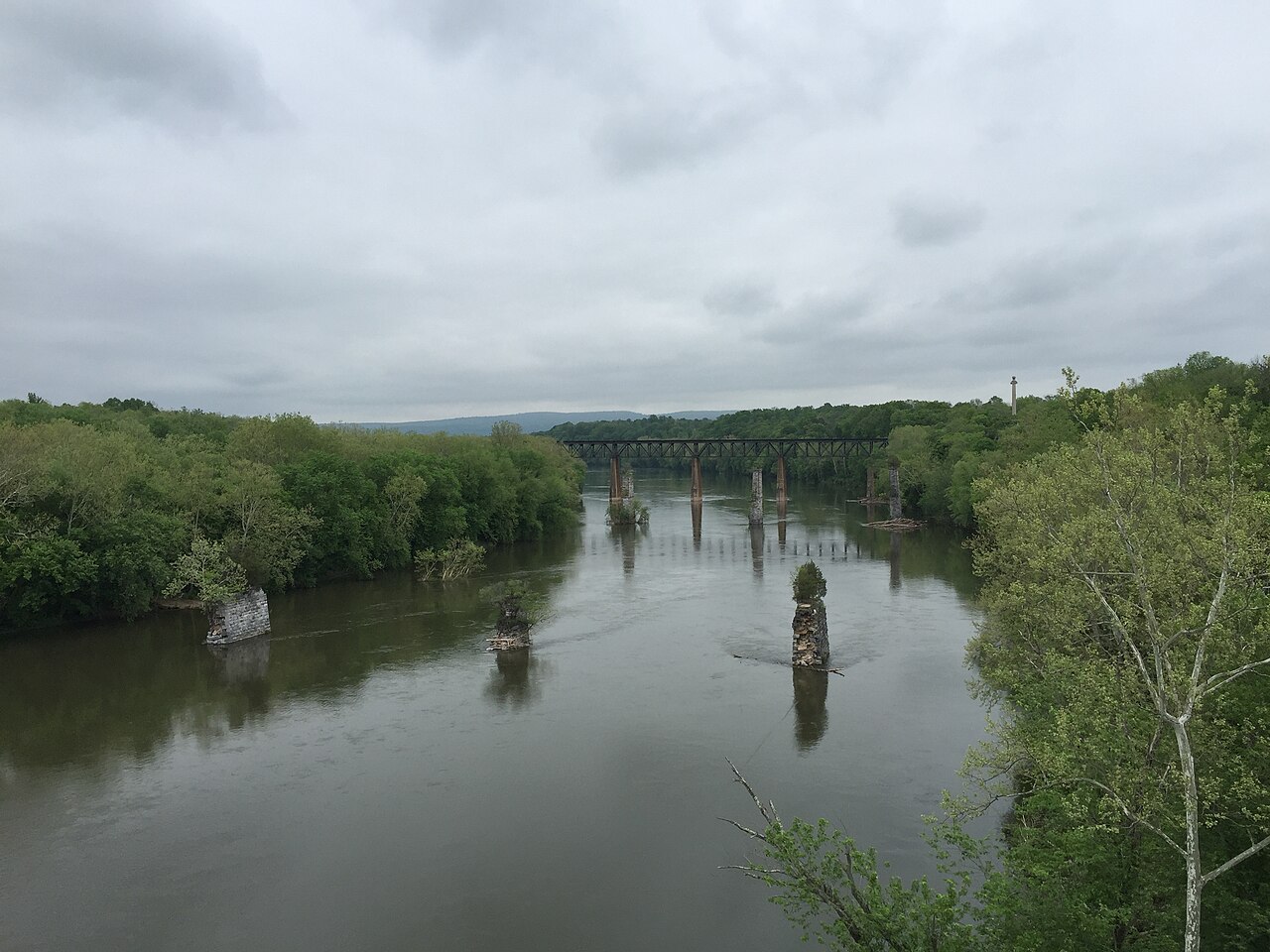The Potomac River and railroad bridge piers east of the James Rumsey Bridge in Jefferson County, West Virginia.