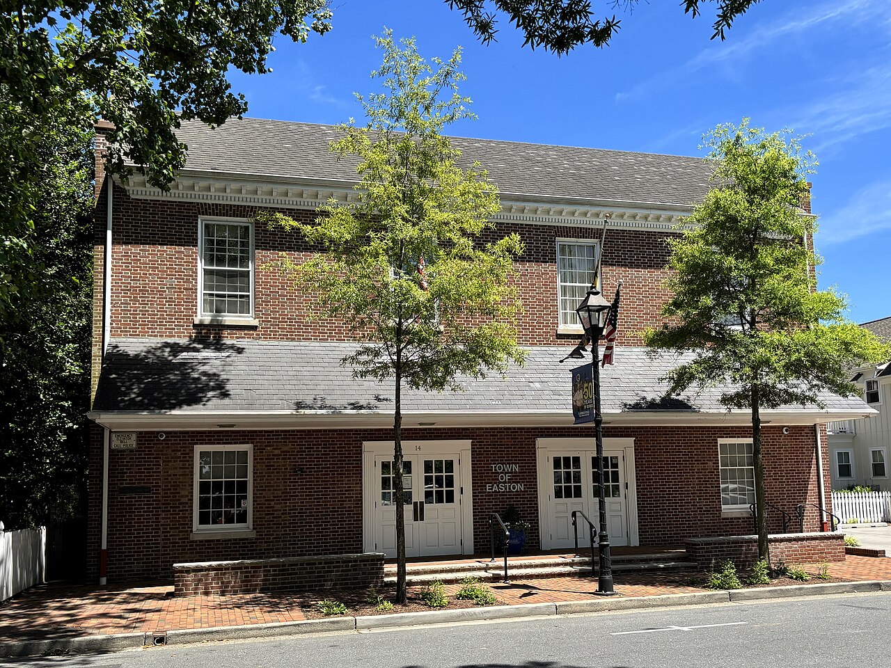 Town of Easton offices on a brick sidewalk in downtown Easton, Maryland.