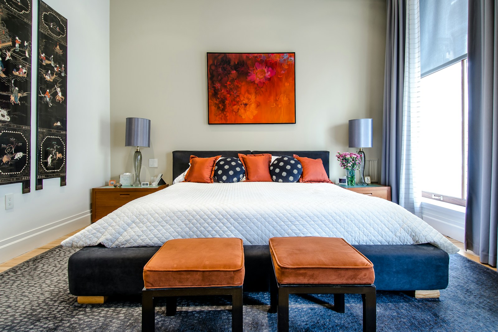 Bedroom with ottomans, no faces