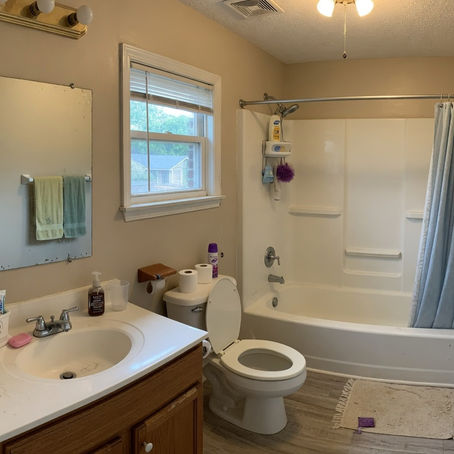 Empty bathroom in a Birmingham vacation rental, lodging interior, no people