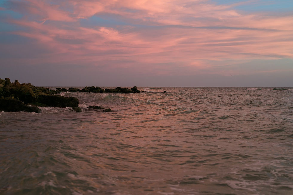Caspersen Beach Gulf rocks at dusk, Venice Florida