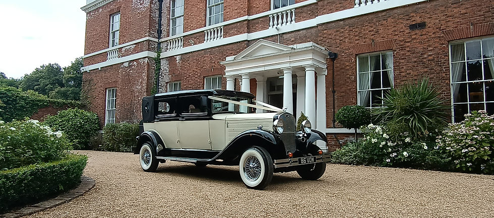 Vintage Wedding Car Hire in Doncaster. The wedding car i parked outside Bawtry Hall