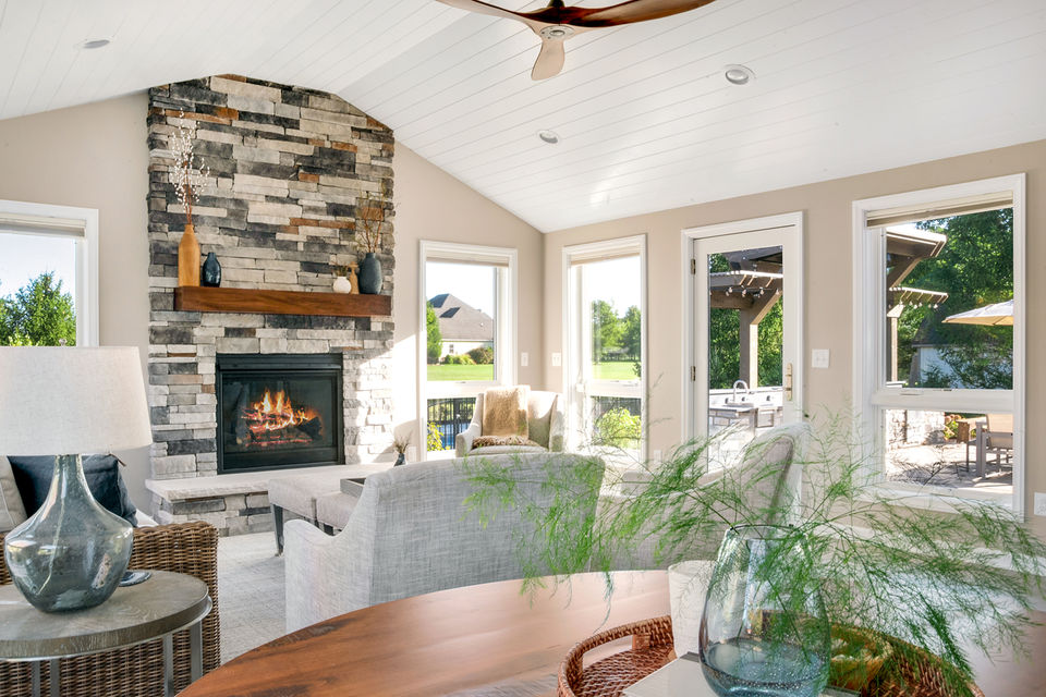 fireplace, couch, chairs, coffee table, table, decor