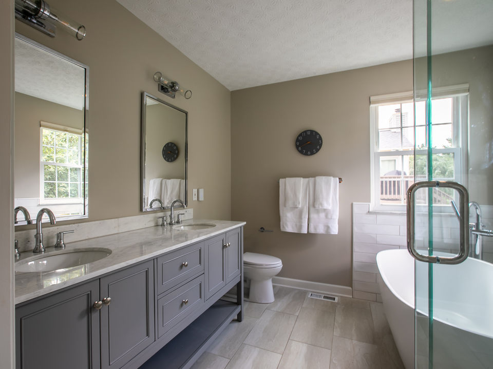 vanity, towels, soaking tub