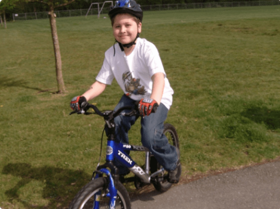 Ben, on his bike, near our home.