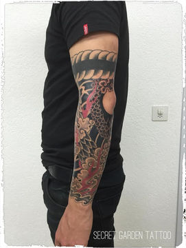Asia Sleeve Tattoo