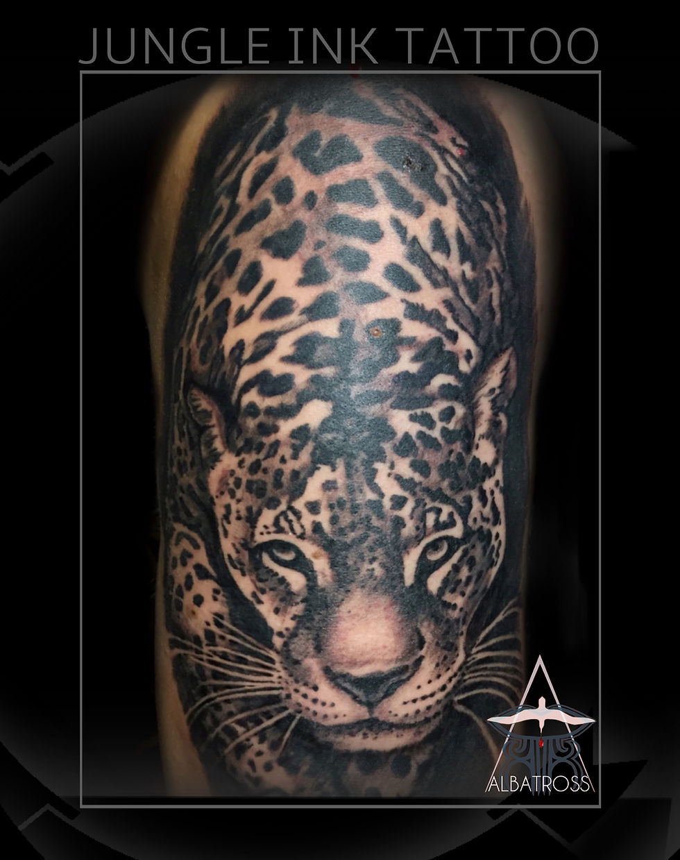 Realistic black and grey leopard tattoo with fine dotwork shading by Jungle Ink Tattoo Brisbane