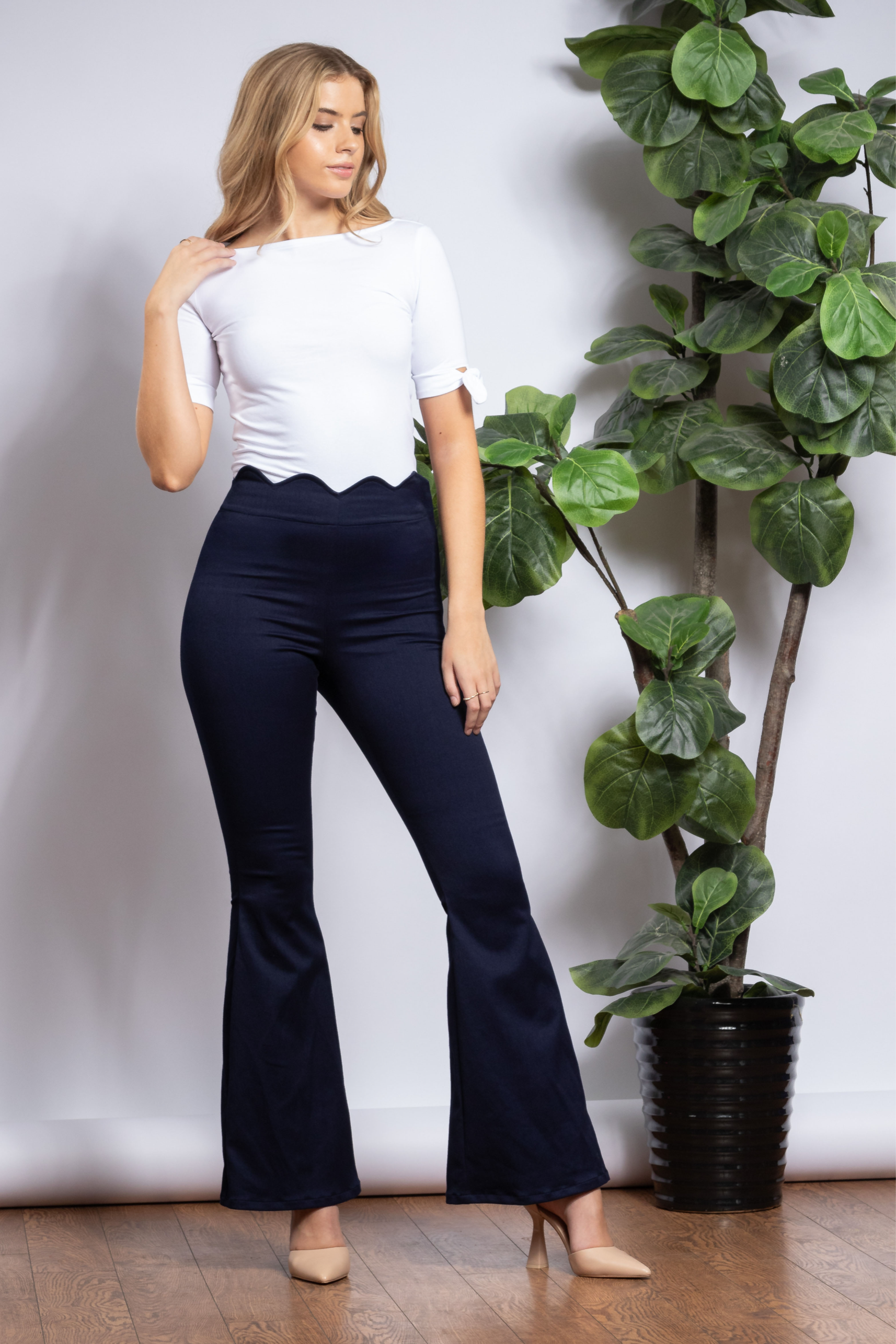 High waisted 70s flare leg jeans with scalloped waist