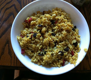 Chard stems & raisins in curried rice.
