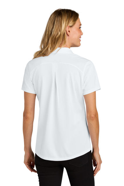 Woman wearing white Port Authority® Silk Touch™ Performance 1/4-Zip (K584), back view