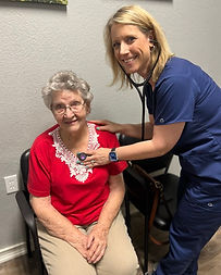 Cynthia McNitt with elderly patient