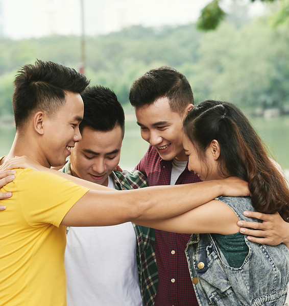 friends hugging each other
