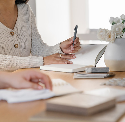 sitting at a desk with a notebook