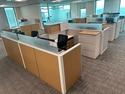 Office cubicles with chairs and computers