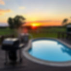 country summer sunset rear deck grilling by the pool with pasture.jpg