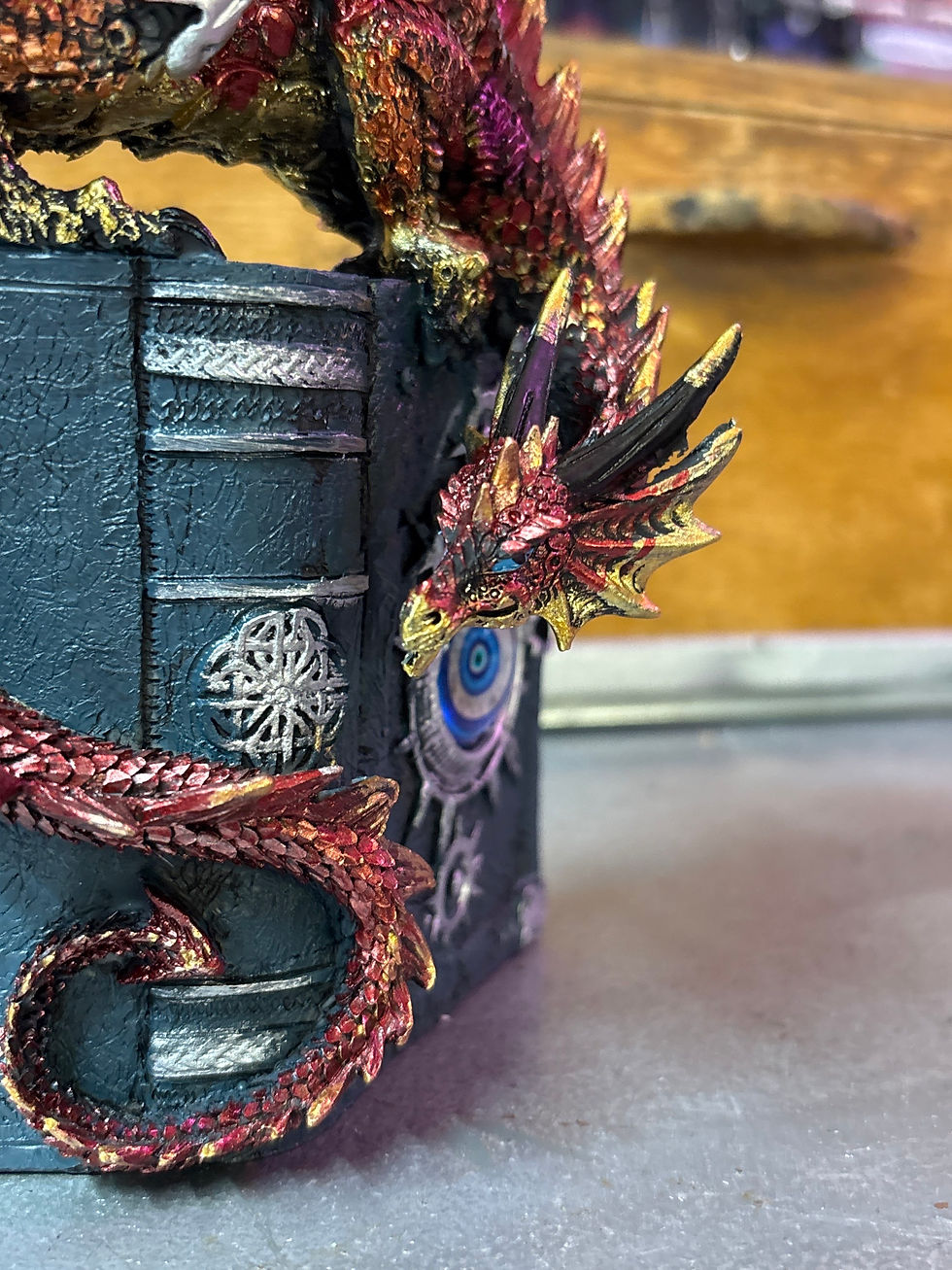 Thumbnail: Dragon on book