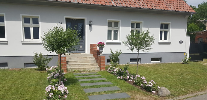 Foto von Haupthaus und Einfahrt