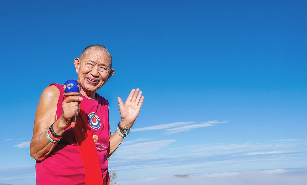 H.E. Garchen Rinpoche and his world peace prayerwheel we made for him at his request