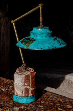 The light photographed at Fort Gilkicker. Its form, surfaces and material palette reference the arch