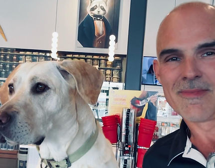 Owner of Silver Lining Ottawa, Matt Brock with his dog Cali