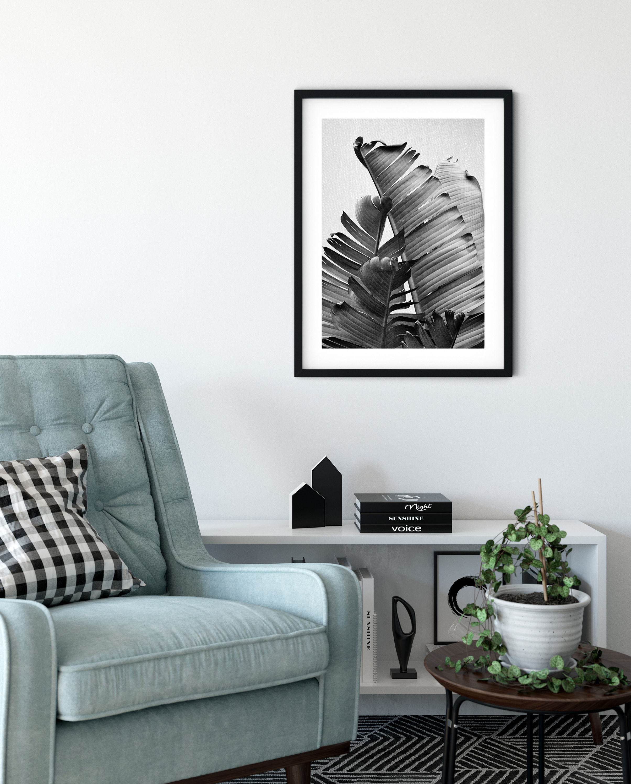 Minimalist tropical wall decor in black and white